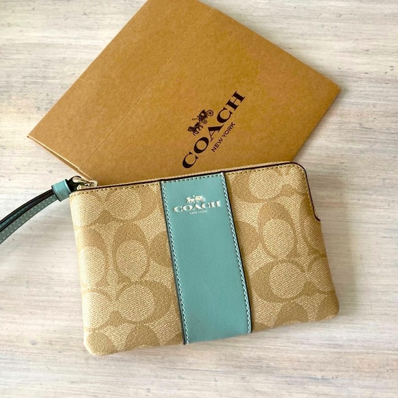 Coach Handbags - NWT COACH Women’s Corner Zip Wristlet in Signature Canvas in Tan Blue